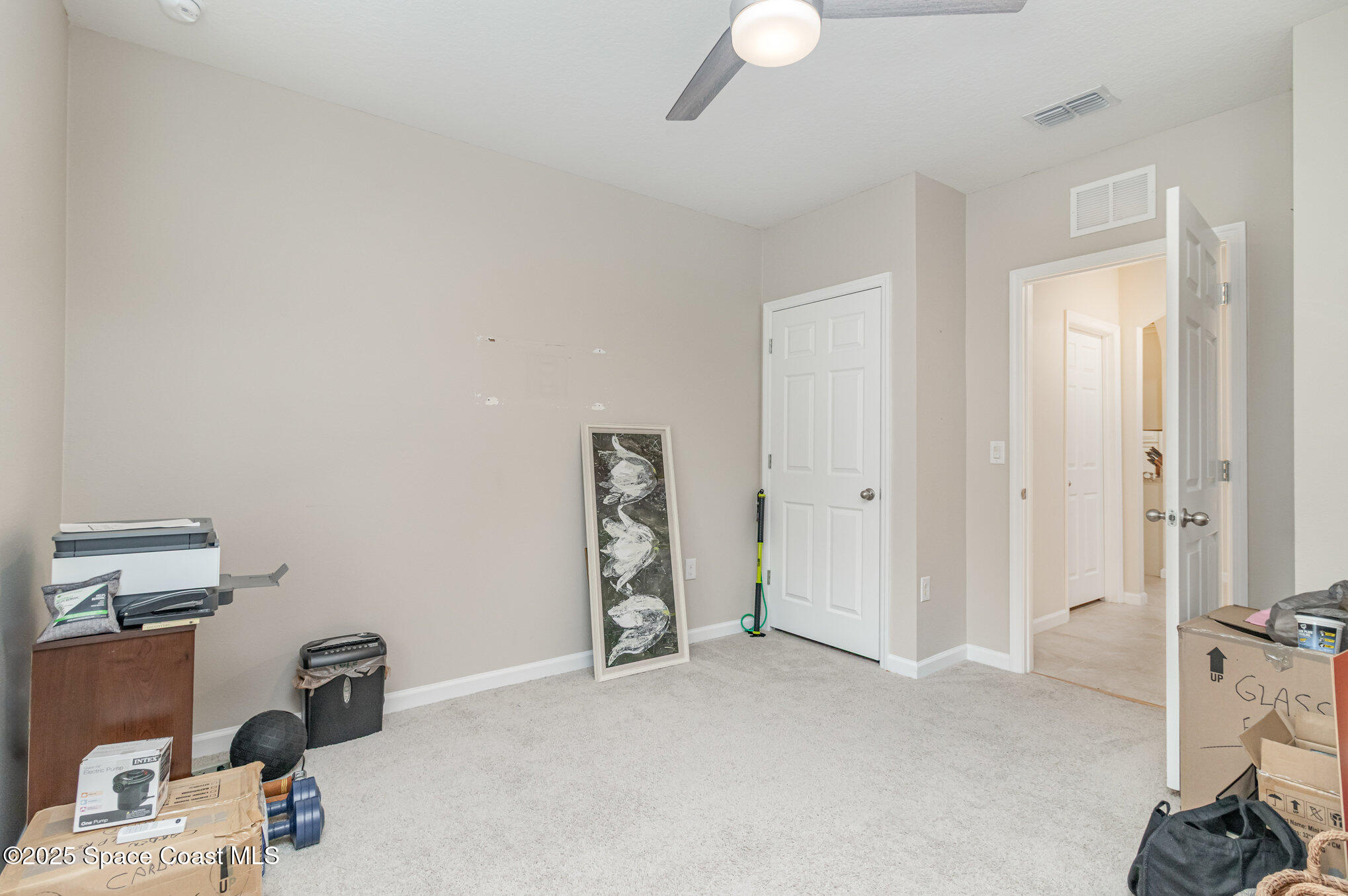 1110 Swiss Pointe Lane Rockledge, FL 32955 - Photo 22 of 26 a view of a room with gym equipment