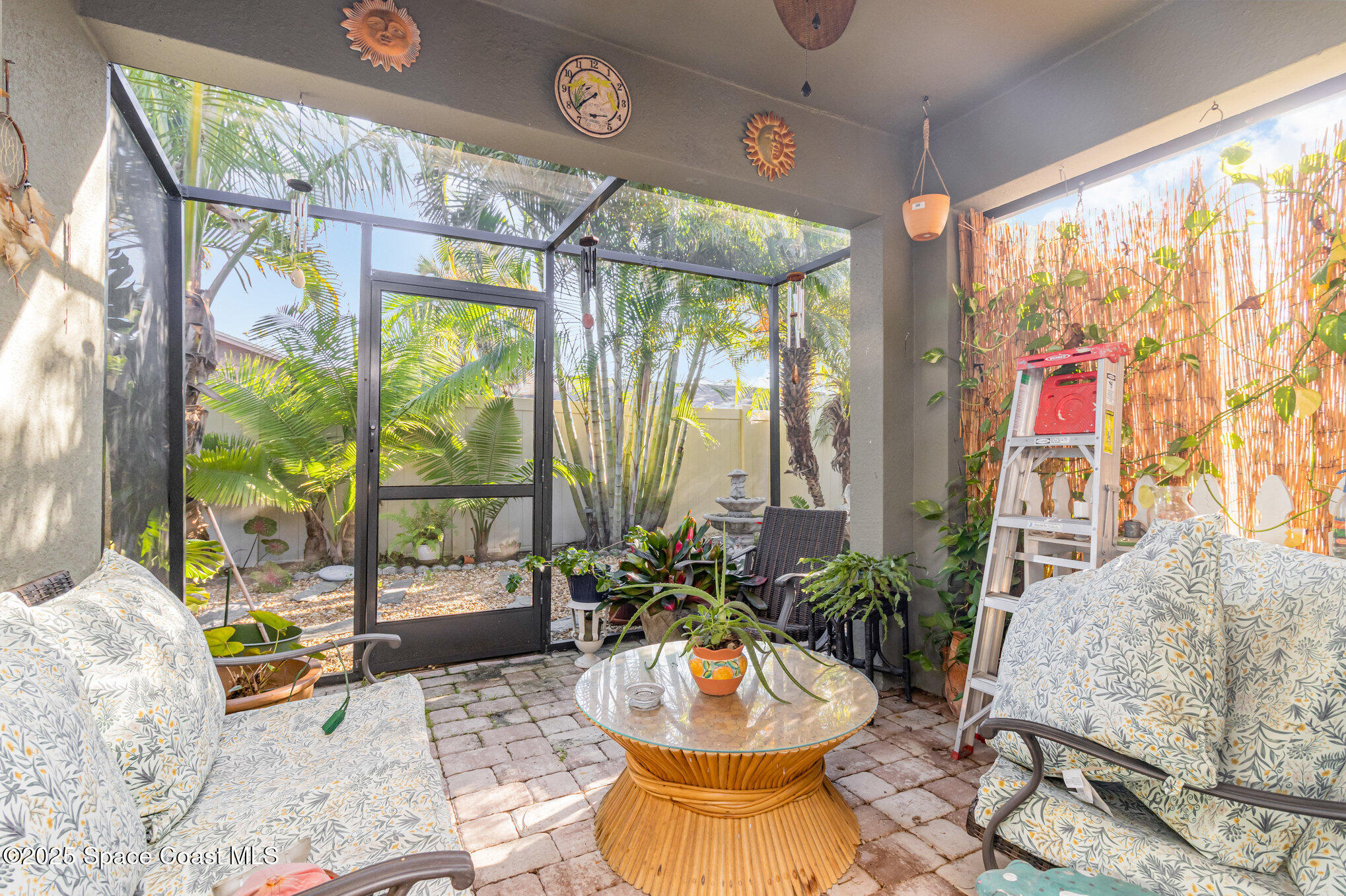 1110 Swiss Pointe Lane Rockledge, FL 32955 - Photo 23 of 26 a living room filled with furniture and a table