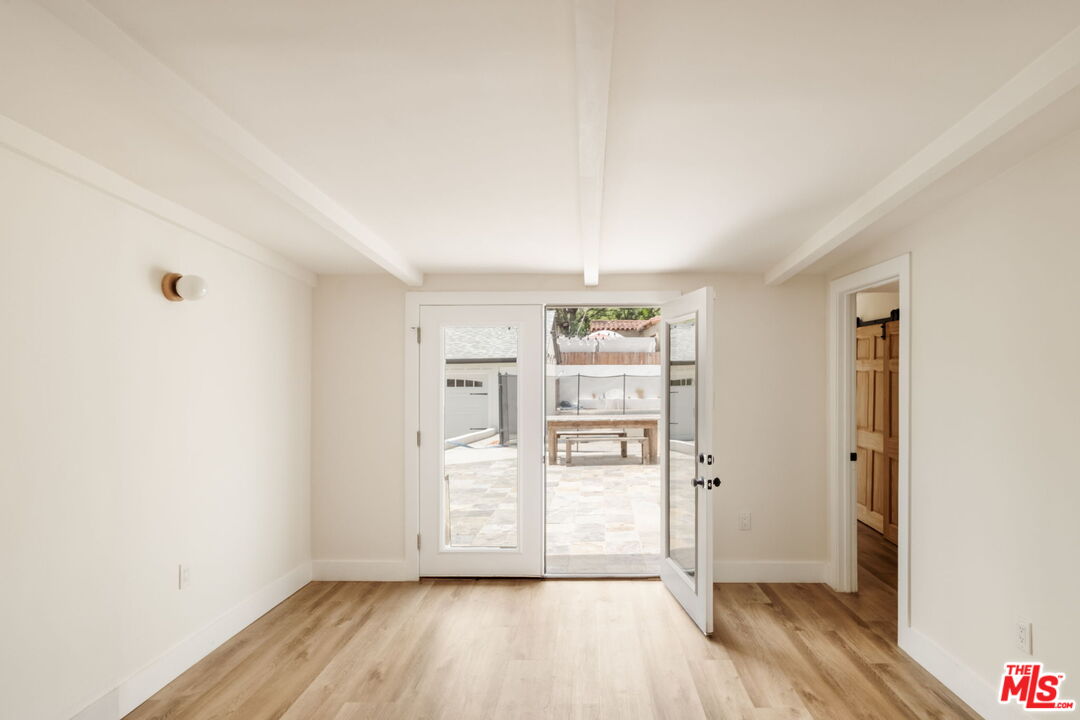 2375 Catherine Road Altadena, CA 91001 - Photo 12 of 26 an empty room with wooden floor and closet