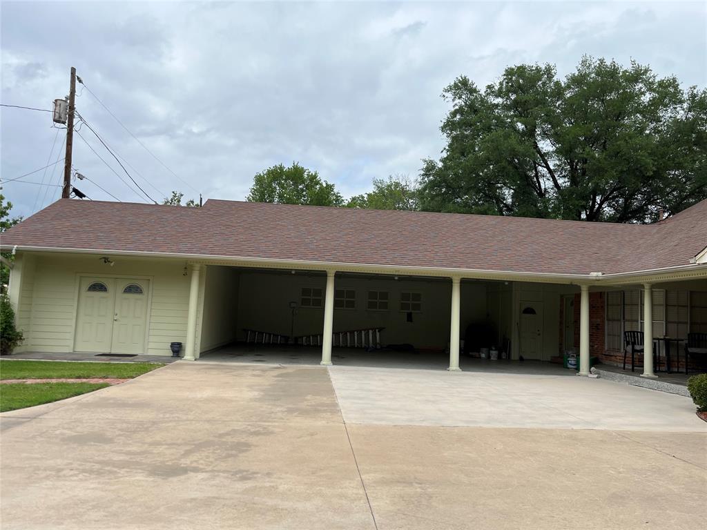 2801 Rix Street Commerce, TX 75428 - Photo 22 of 29 3 car carport with epoxy finish