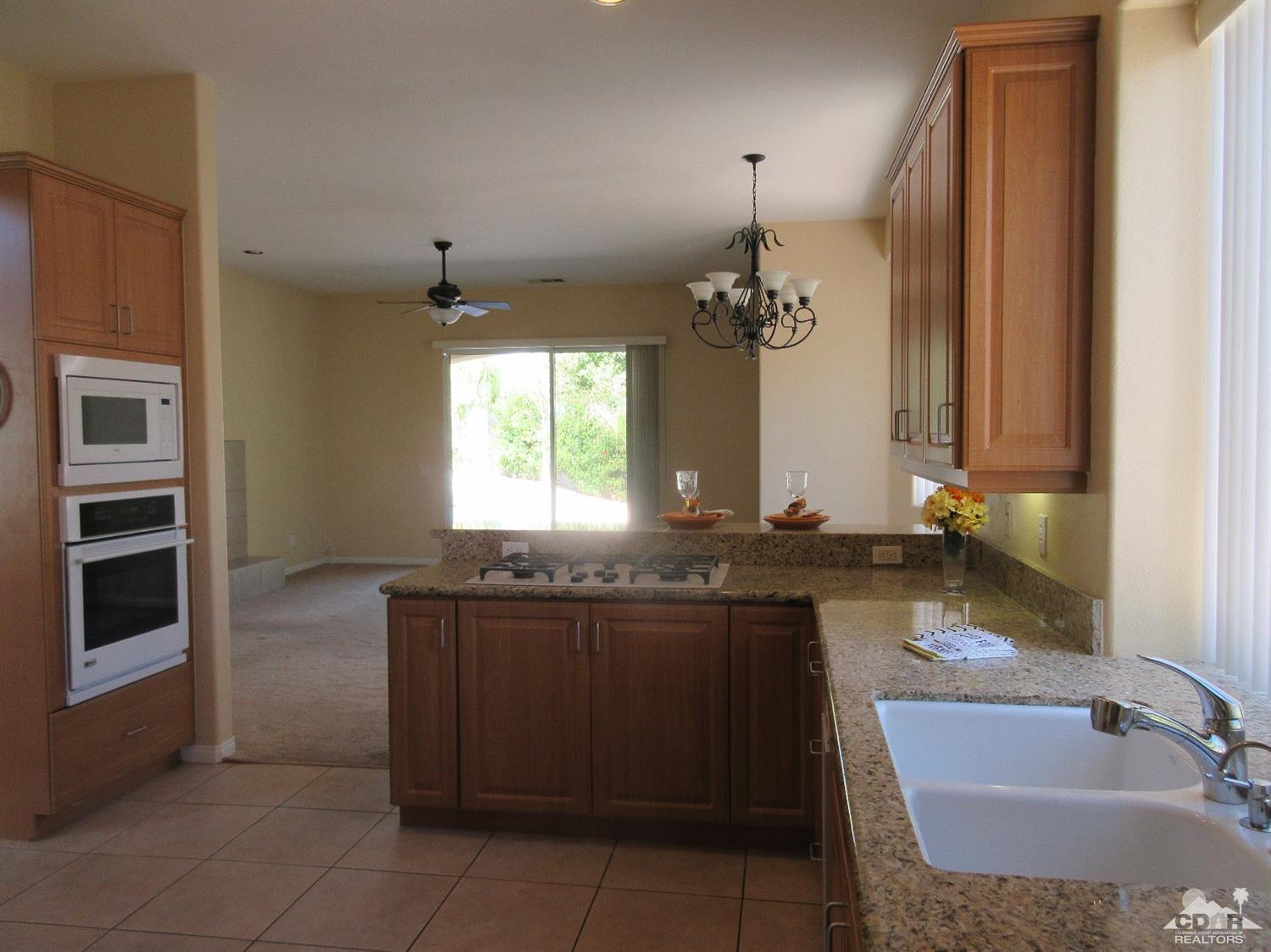 42 Provence Way Rancho Mirage, CA 92270 - Photo 8 of 22 a bathroom with a sink and a mirror