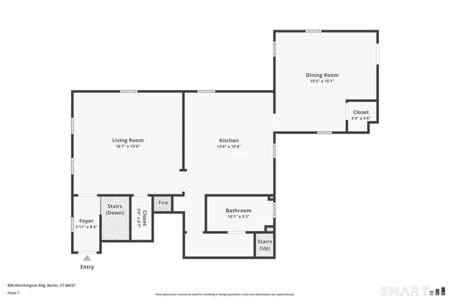 a picture of a room with a white wall and a refrigerator