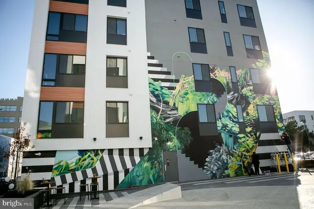 a outdoor living space with patio furniture and a potted plant