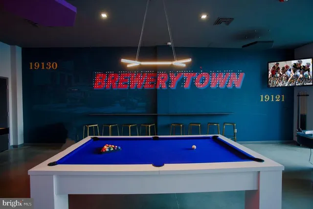 a patio with table and chairs