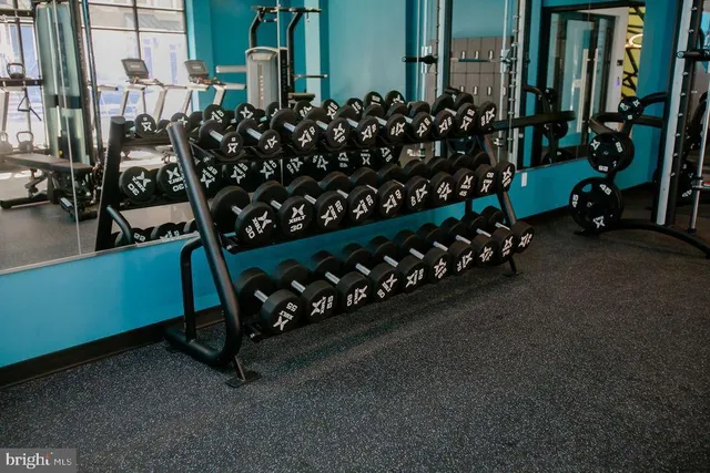 an aerial view of a chairs and table in a patio