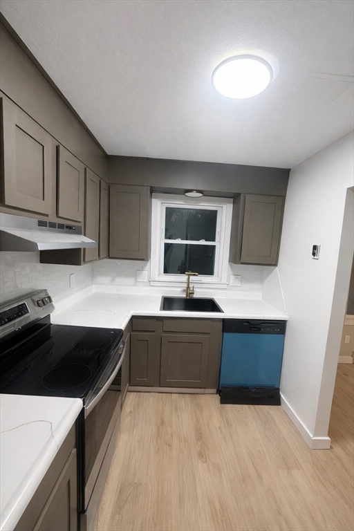 116 Breckwood Circle Springfield, MA 01119 - Photo 3 of 20 a kitchen with stainless steel appliances granite countertop a sink and a stove