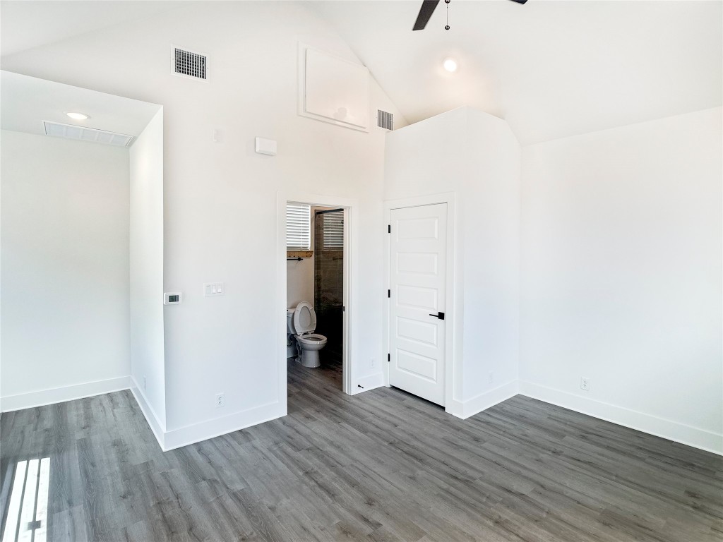 6107 Begonia Circle, Unit 3 Austin, TX 78741 - Photo 15 of 21 a view of an empty room with wooden floor