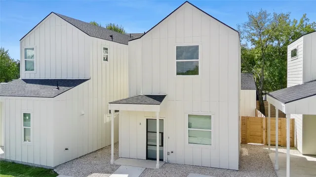 a view of house with garage