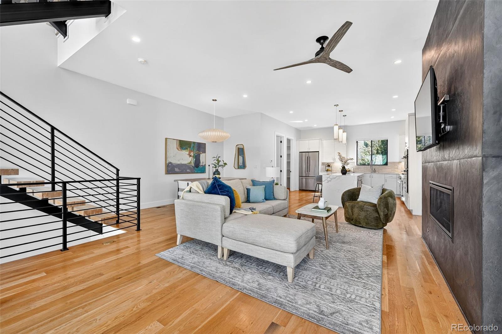1150 26th Street Denver, CO 80205 - Photo 16 of 50 a living room with furniture fireplace and flat screen tv