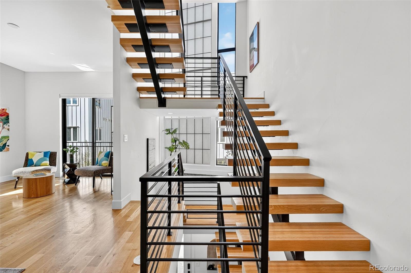 1150 26th Street Denver, CO 80205 - Photo 17 of 50 a view of entryway and hall with wooden floor