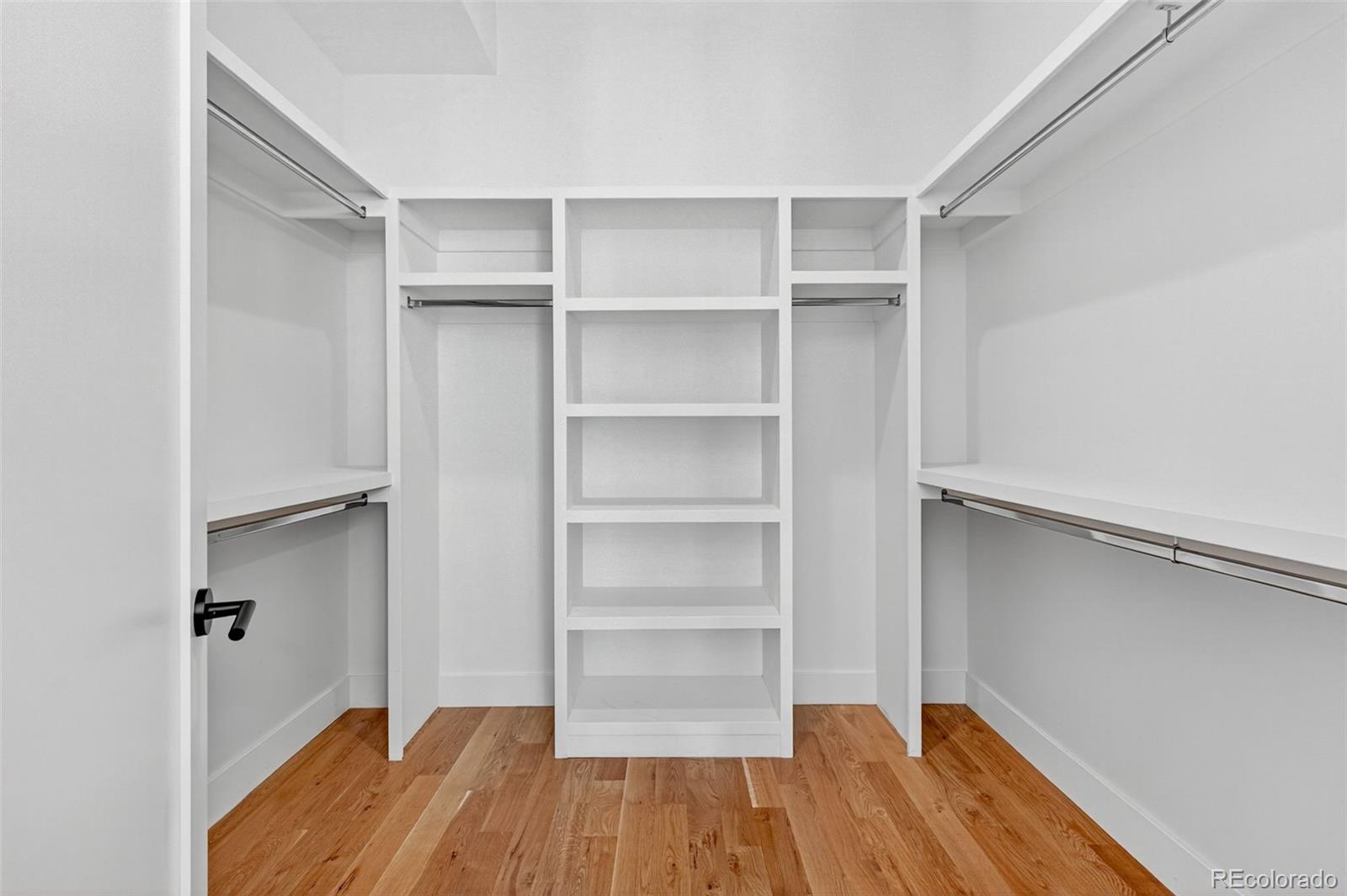 1150 26th Street Denver, CO 80205 - Photo 25 of 50 a view of walk in closet with empty racks