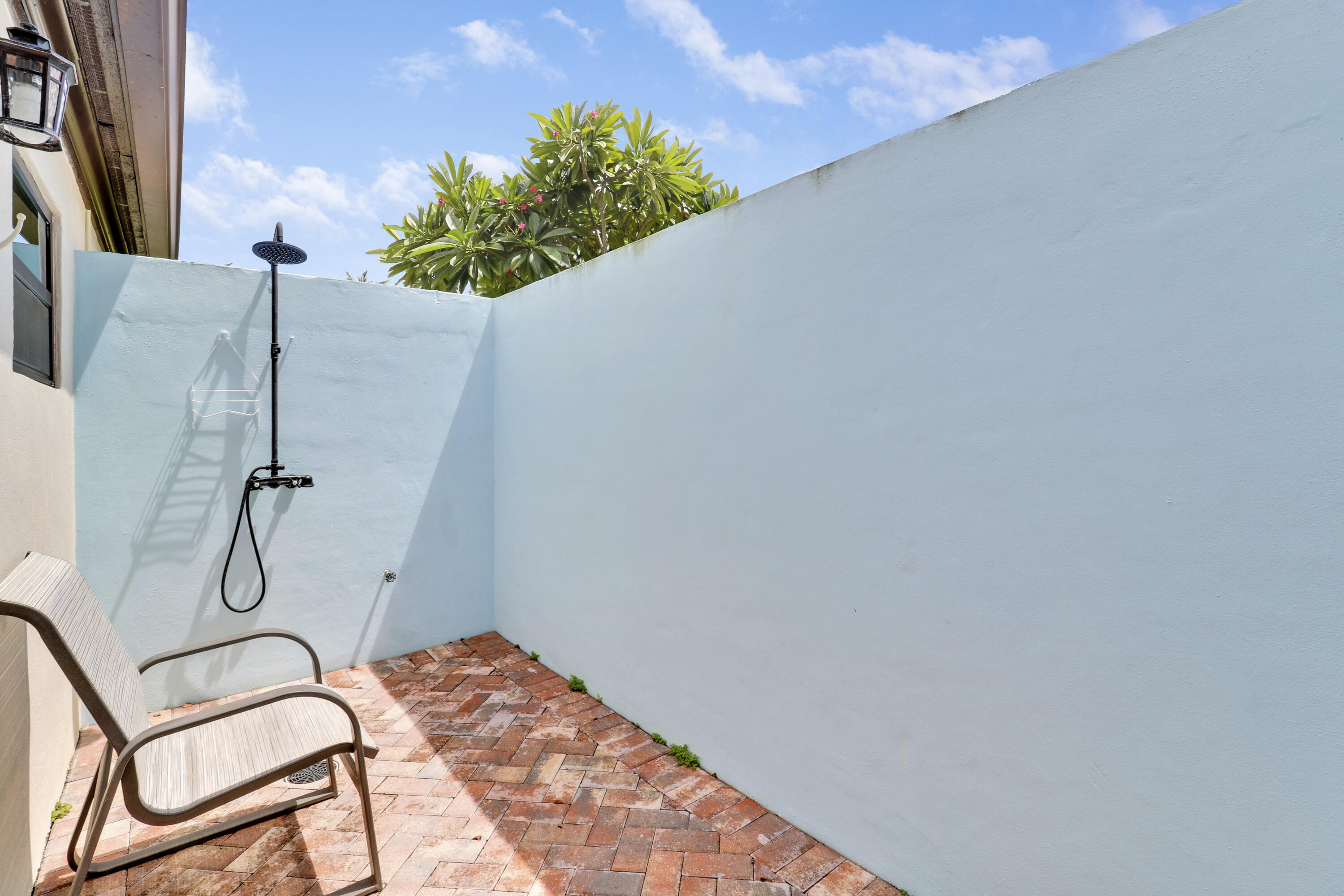 1472 Via Cameron Jupiter, FL 33477 - Photo 21 of 24 Outdoor Shower off Primary Bedroom