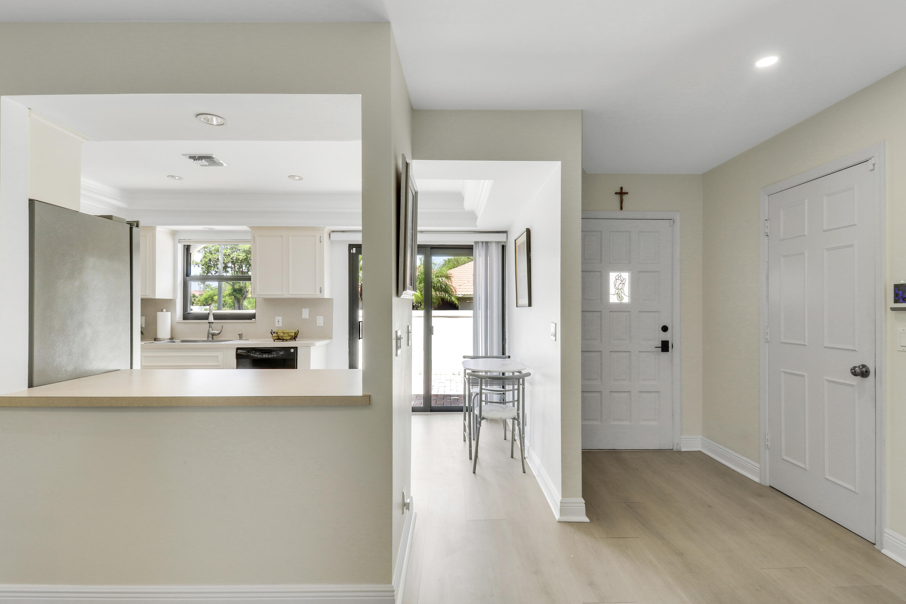 1472 Via Cameron Jupiter, FL 33477 - Photo 4 of 24 Foyer and Kitchen