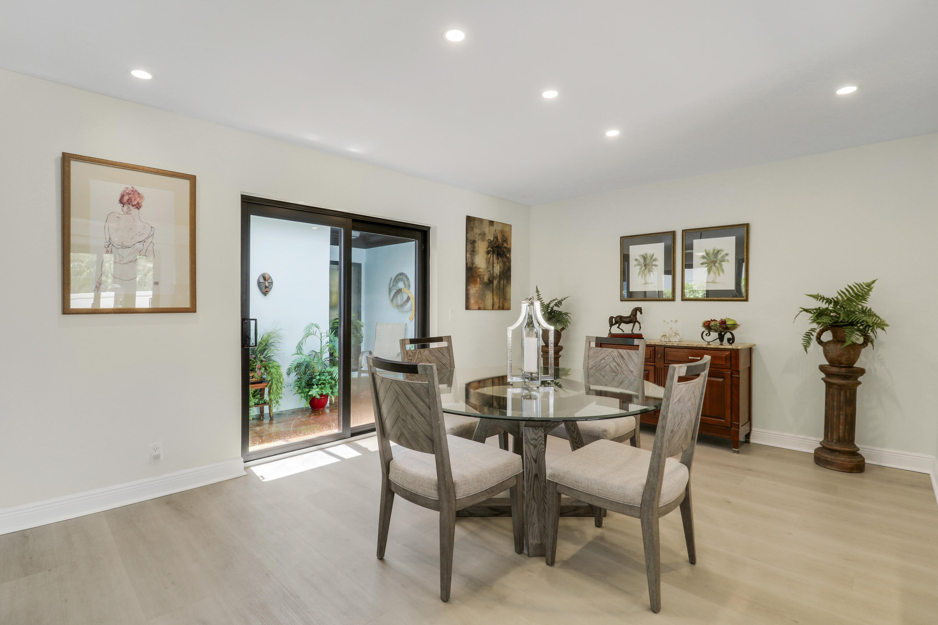 1472 Via Cameron Jupiter, FL 33477 - Photo 9 of 24 Dining and Inner Courtyard