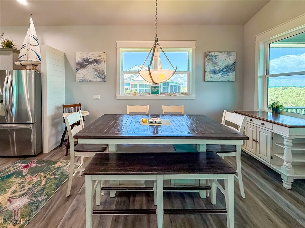 631 Rum Road Upper Captiva, FL 33924 - Photo 14 of 50 a living room with chairs and a table