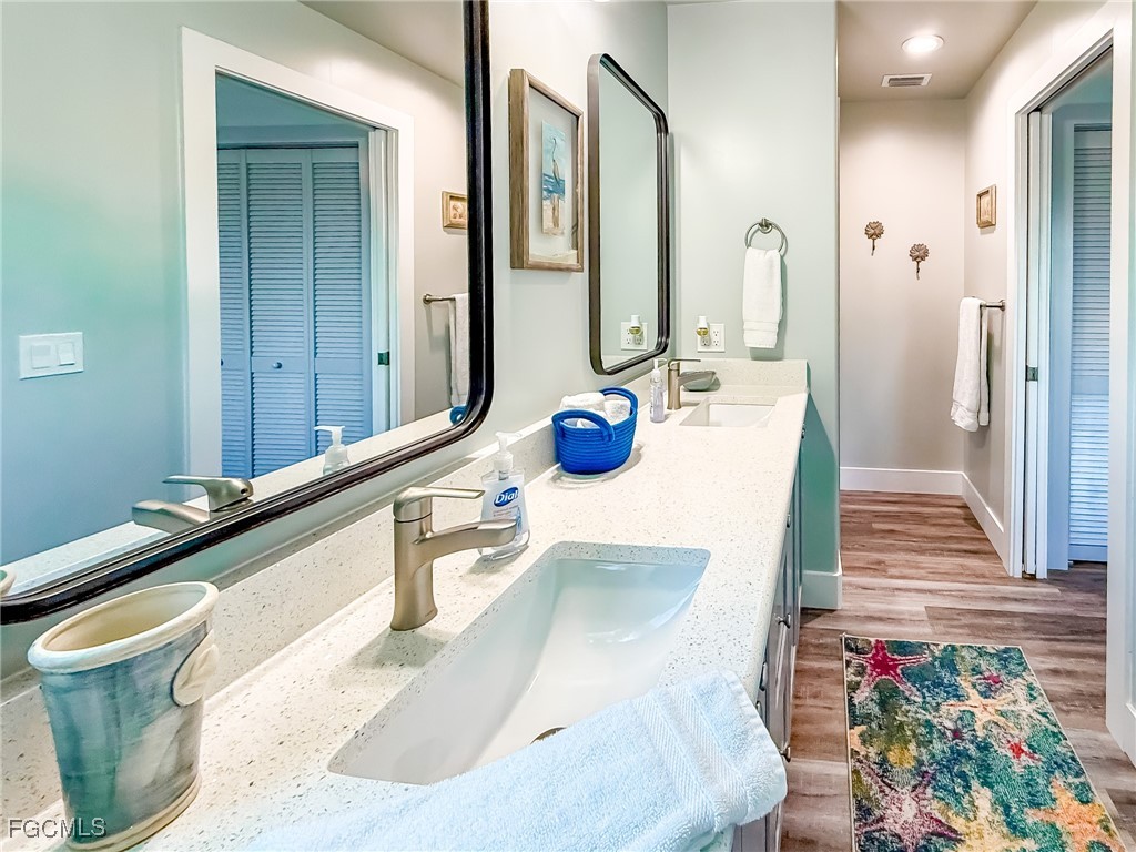 631 Rum Road Upper Captiva, FL 33924 - Photo 24 of 50 a bathroom with a tub sink and mirror