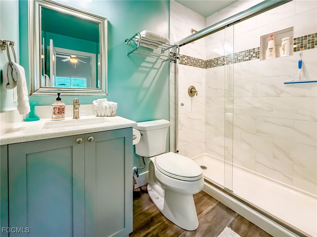 631 Rum Road Upper Captiva, FL 33924 - Photo 32 of 50 a bathroom with a sink and a mirror