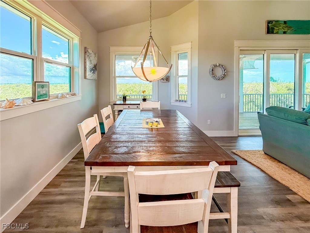 631 Rum Road Upper Captiva, FL 33924 - Photo 42 of 50 a dining room with furniture and window