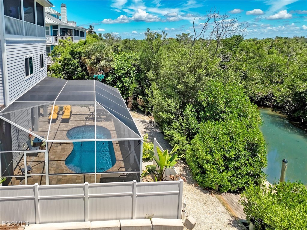 631 Rum Road Upper Captiva, FL 33924 - Photo 49 of 50 a backyard of a house with lots of green space