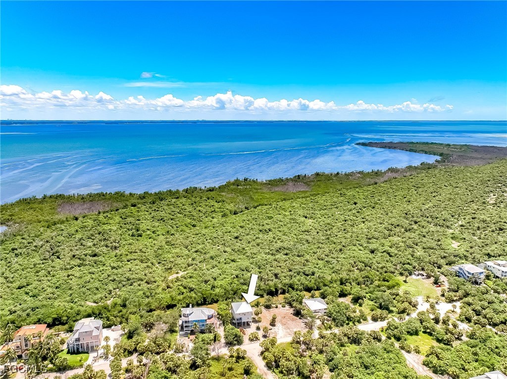631 Rum Road Upper Captiva, FL 33924 - Photo 50 of 50 a view of a large yard with lots of green space