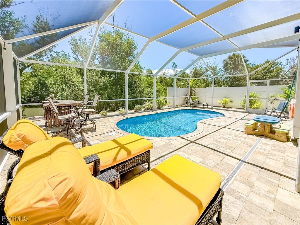 631 Rum Road Upper Captiva, FL 33924 - Photo 6 of 50 a view of a swimming pool with a patio