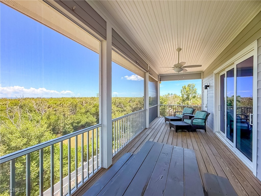 631 Rum Road Upper Captiva, FL 33924 - Photo 10 of 50 a view of a porch with wooden floor