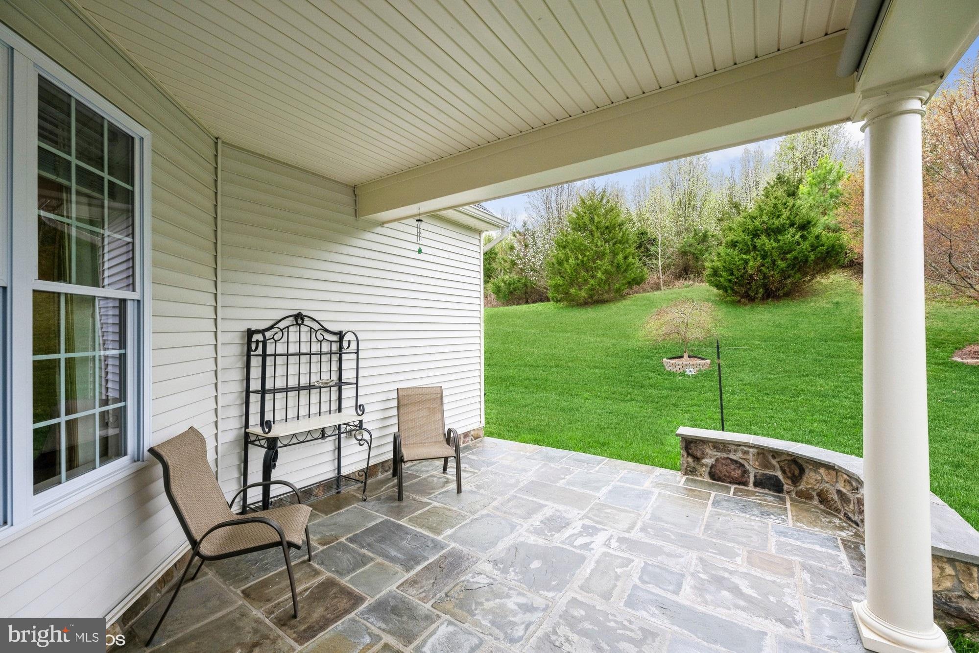 7420 Lees Command Boulevard Fredericksburg, VA 22407 - Photo 33 of 36 Stone patio with seat wall