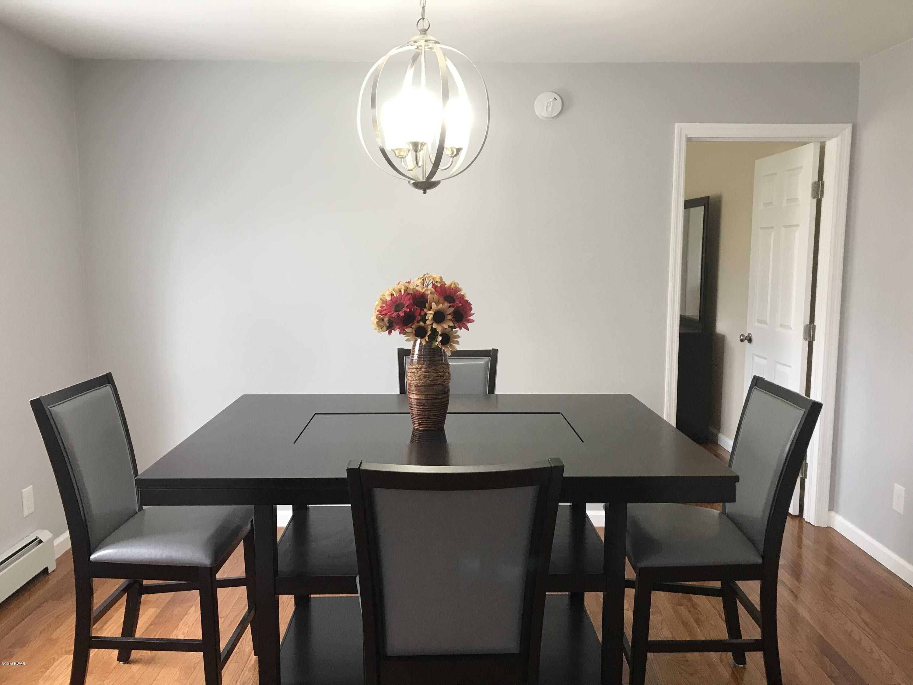 81 Callapoose Road Moscow, PA 18444 - Photo 9 of 24 Formal Dining room