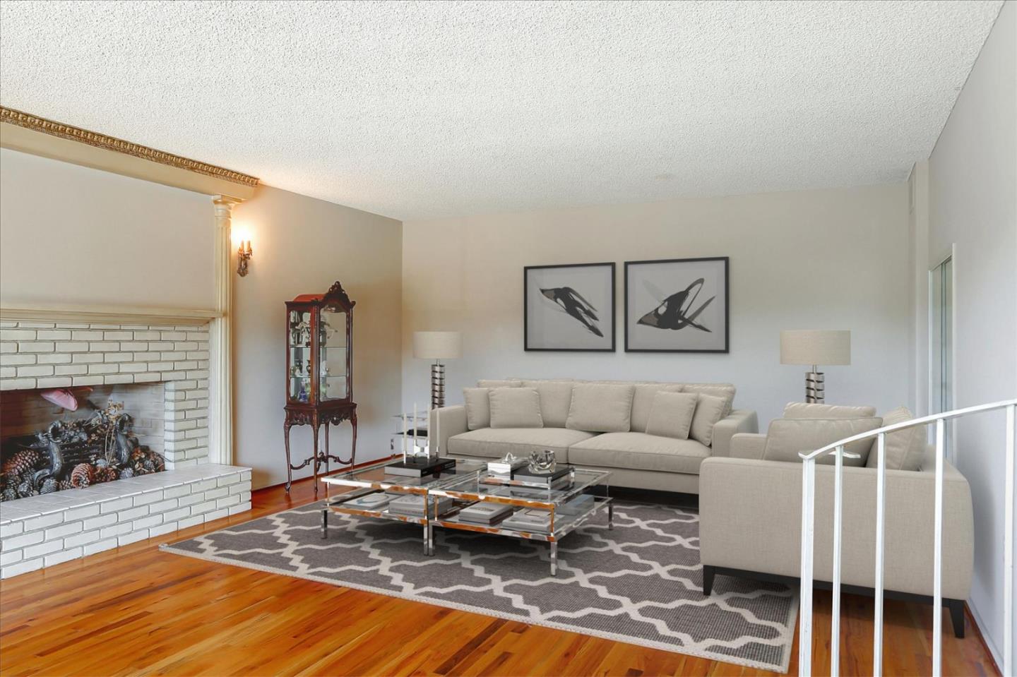 3235 Rio Road Carmel, CA 93923 - Photo 13 of 40 a living room with furniture and a fireplace