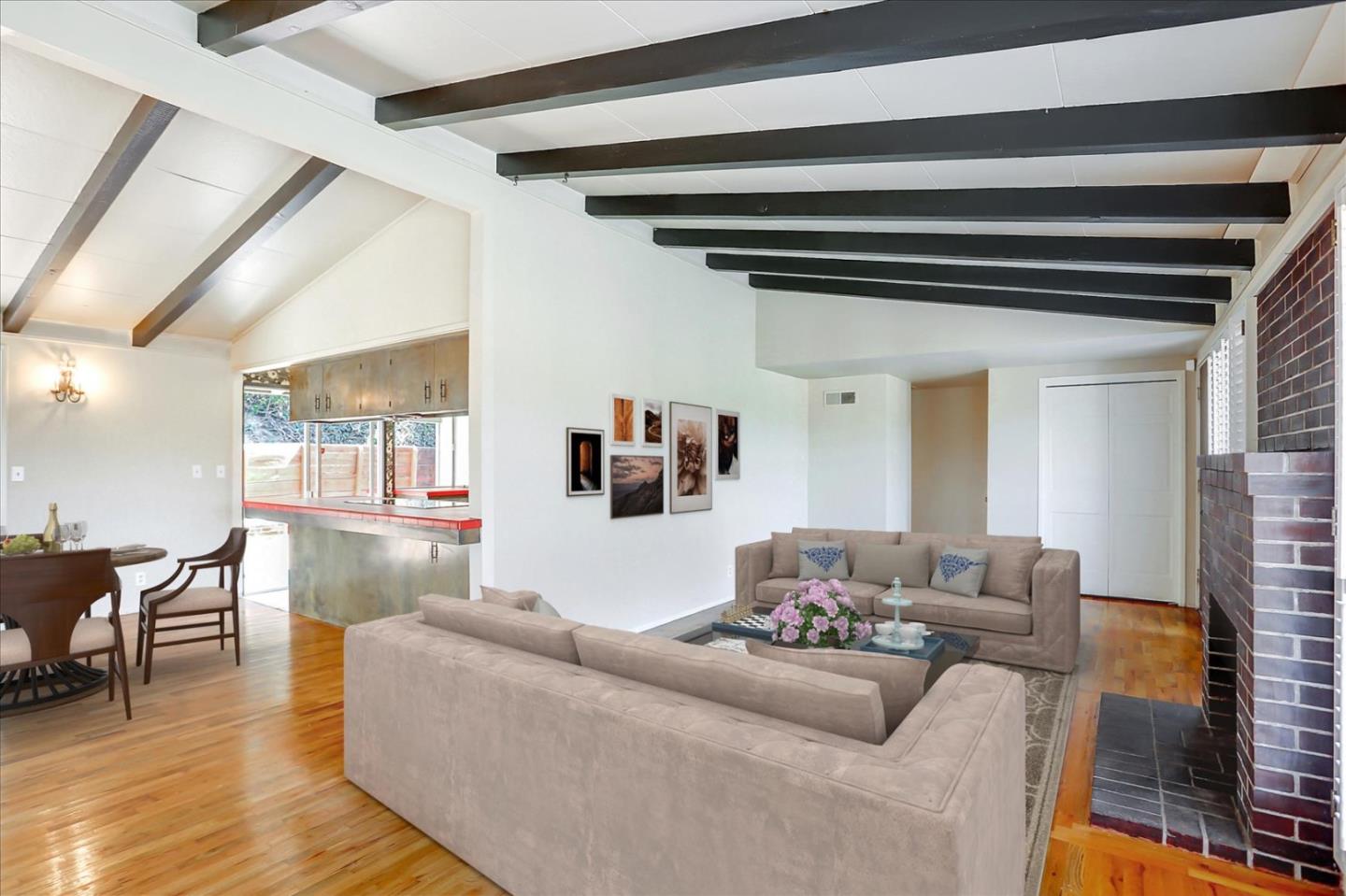 3235 Rio Road Carmel, CA 93923 - Photo 14 of 40 a living room with furniture and a wooden floor