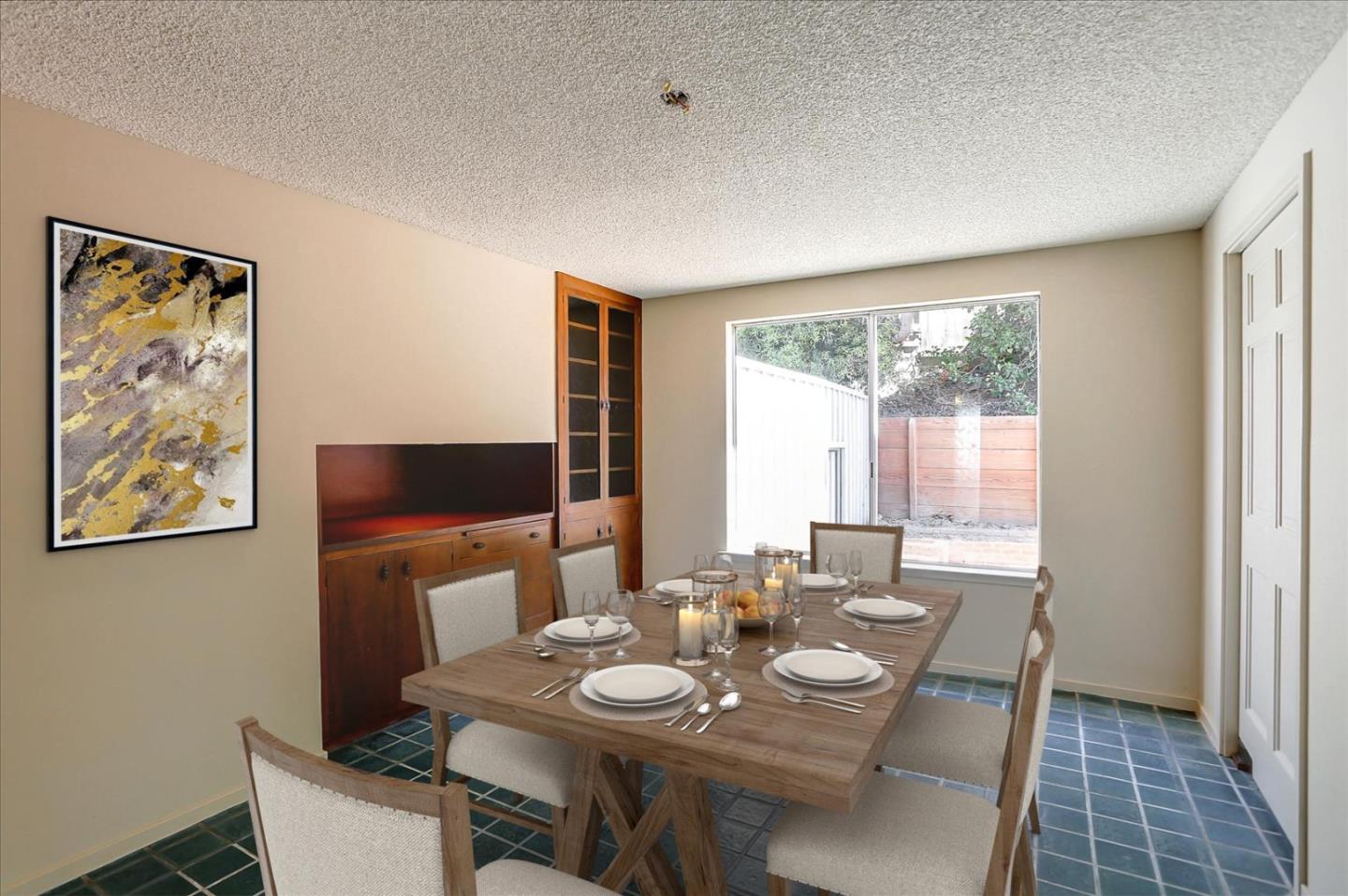 3235 Rio Road Carmel, CA 93923 - Photo 17 of 40 a dining room with furniture and window