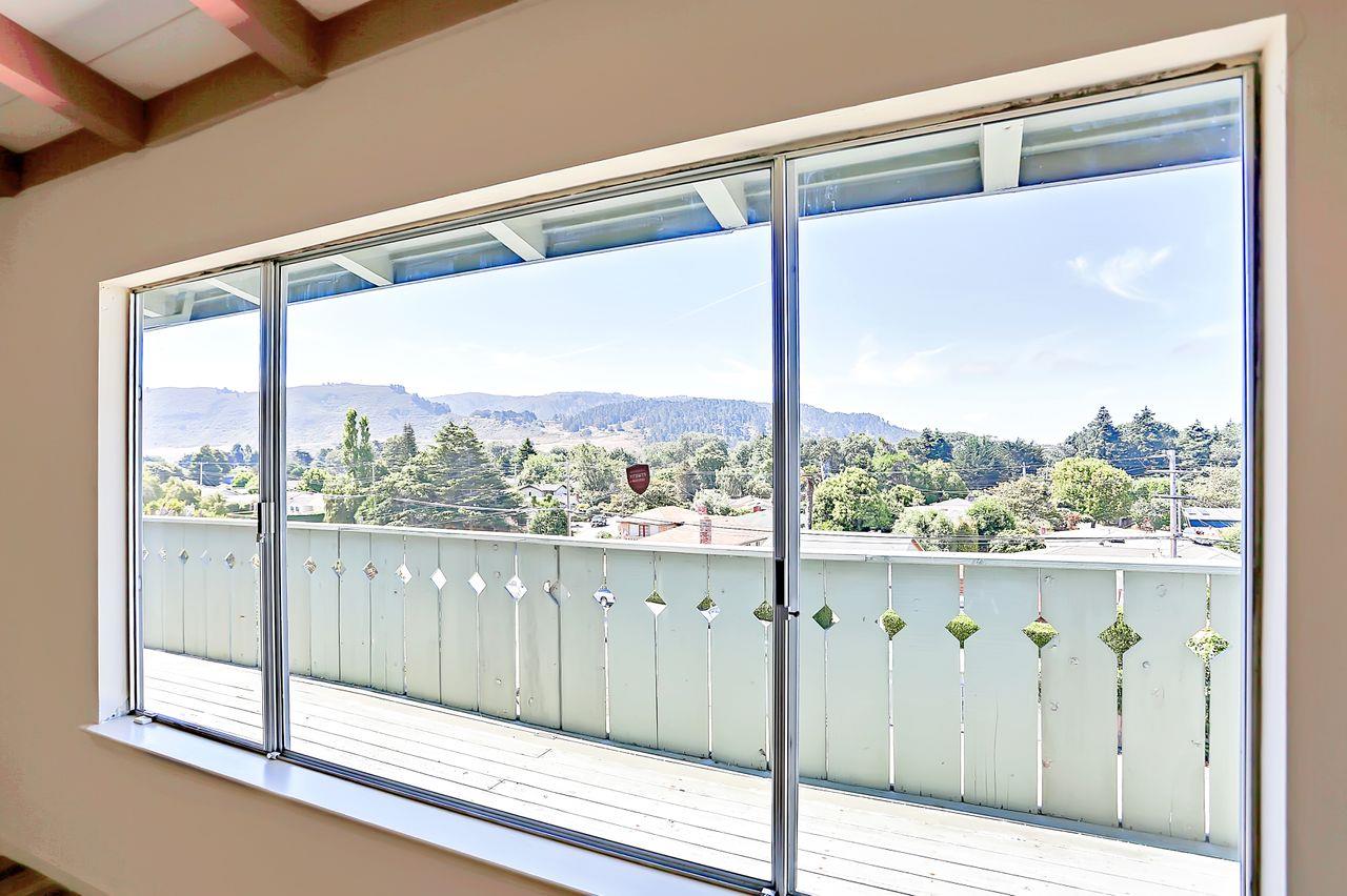 3235 Rio Road Carmel, CA 93923 - Photo 34 of 40 a view of a glass door with a from window