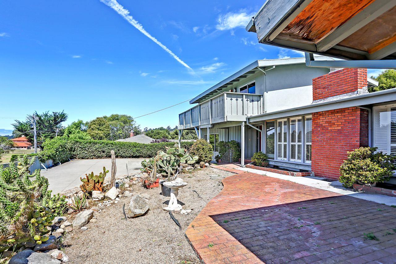 3235 Rio Road Carmel, CA 93923 - Photo 8 of 40 a view of a house with sitting area and furniture