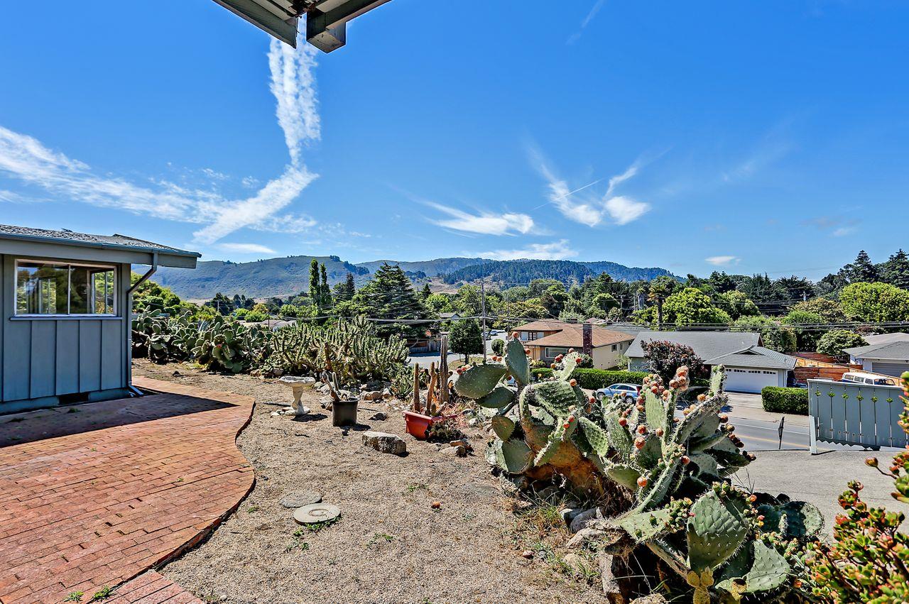 3235 Rio Road Carmel, CA 93923 - Photo 9 of 40 a view of a terrace with a garden