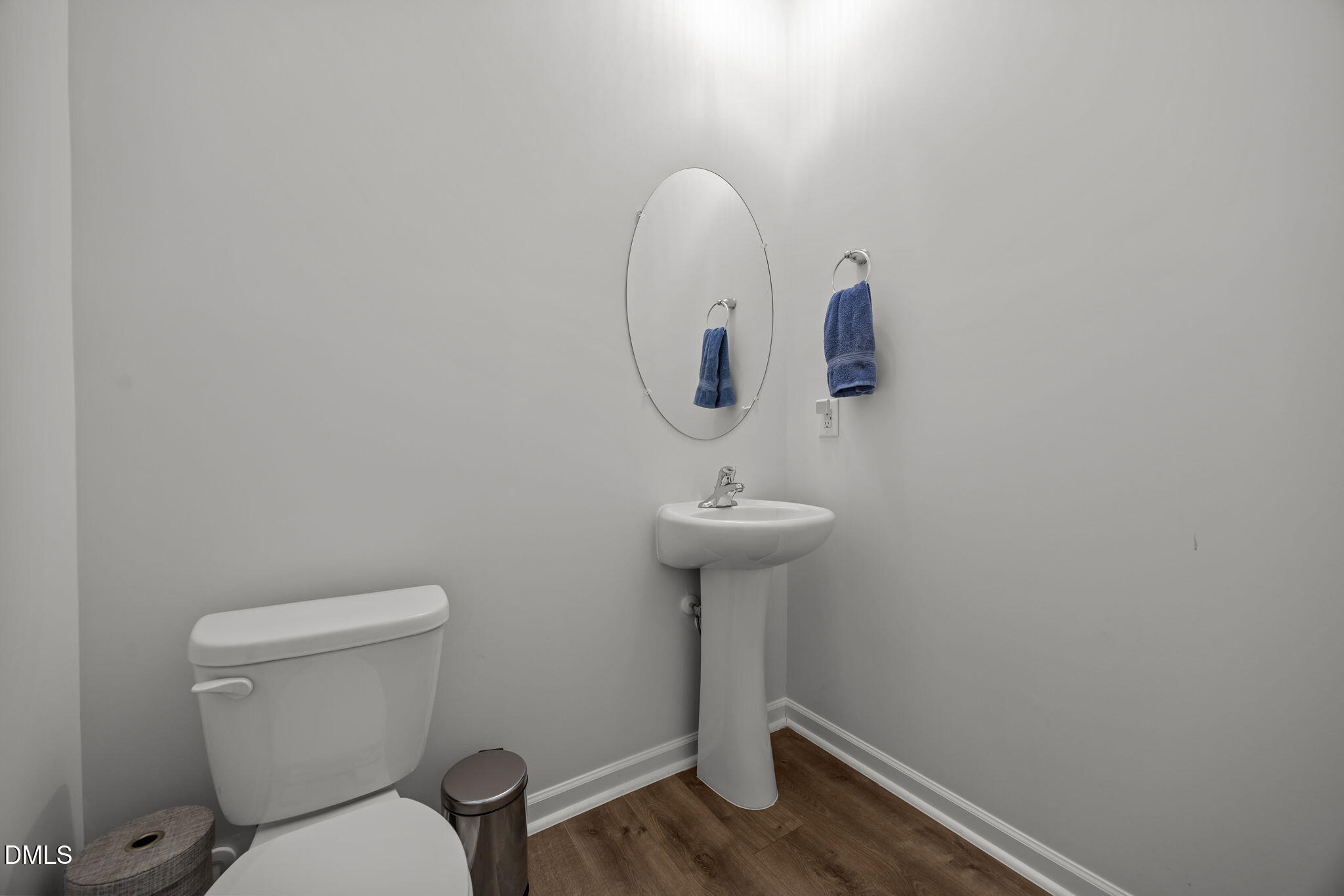 2117 Fletchers Ridge Drive Durham, NC 27703 - Photo 11 of 46 a bathroom with a sink toilet and a mirror