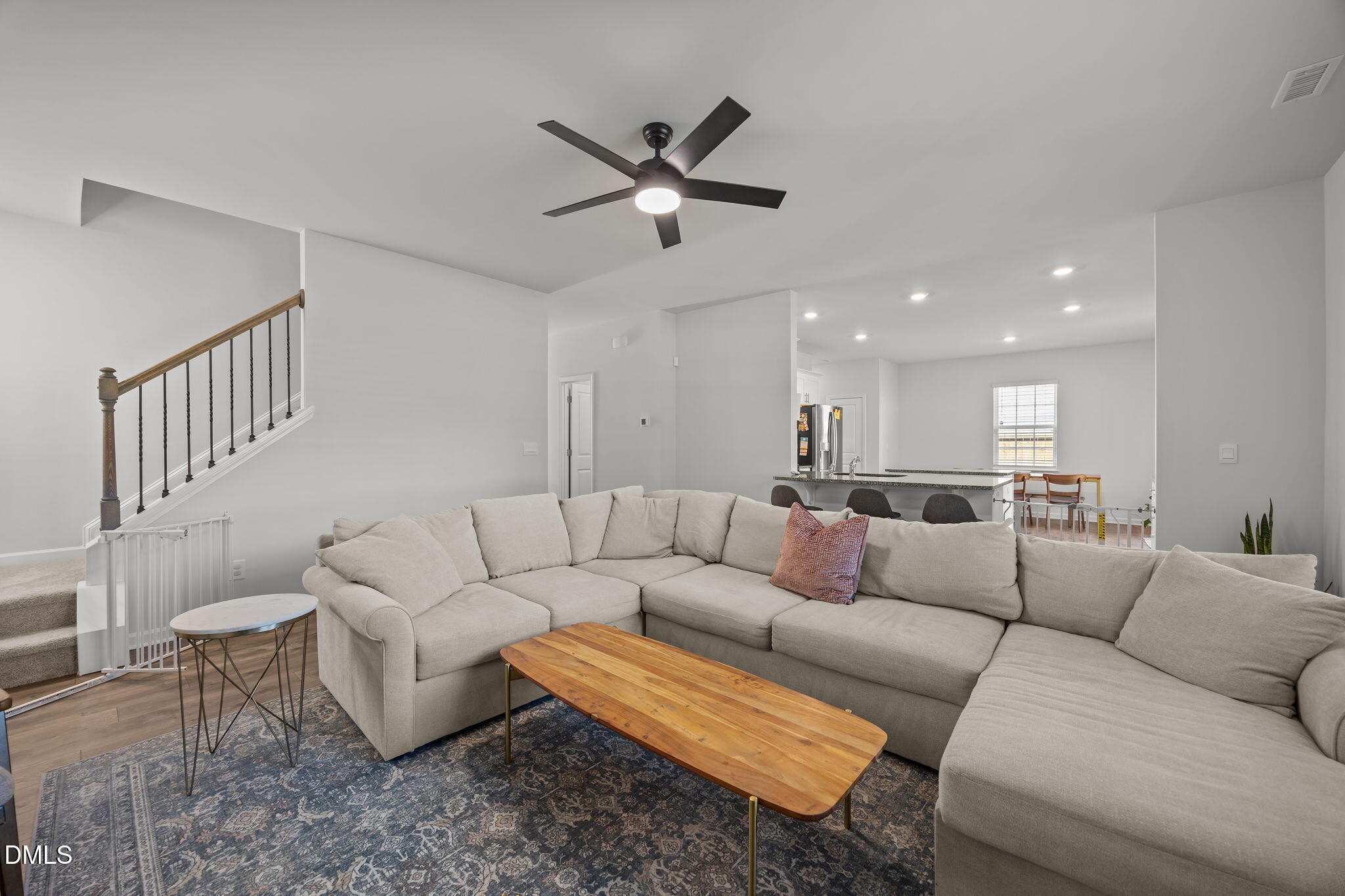 2117 Fletchers Ridge Drive Durham, NC 27703 - Photo 15 of 46 a living room with furniture and a ceiling fan