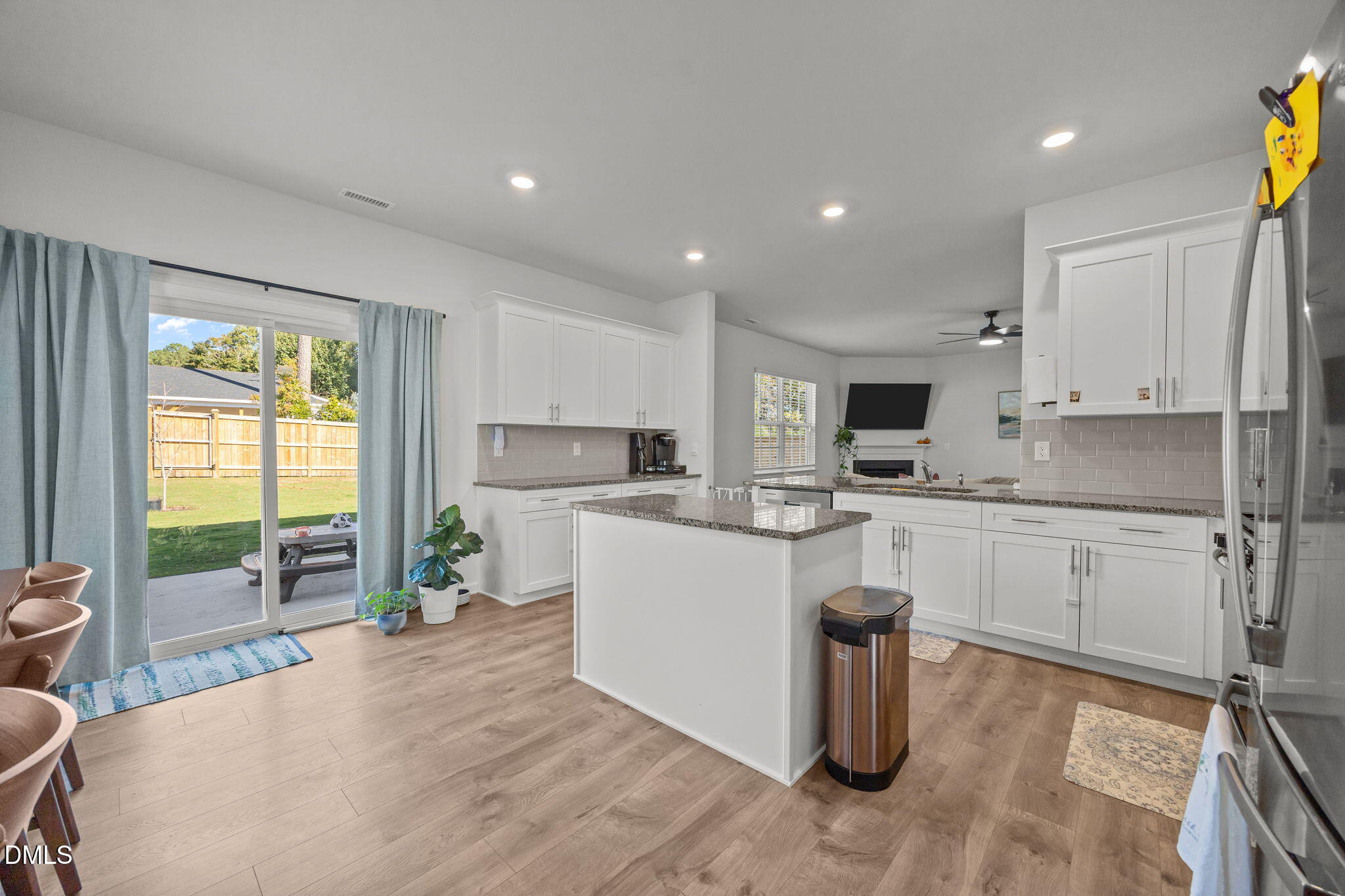 2117 Fletchers Ridge Drive Durham, NC 27703 - Photo 19 of 46 a kitchen with a sink stove and refrigerator