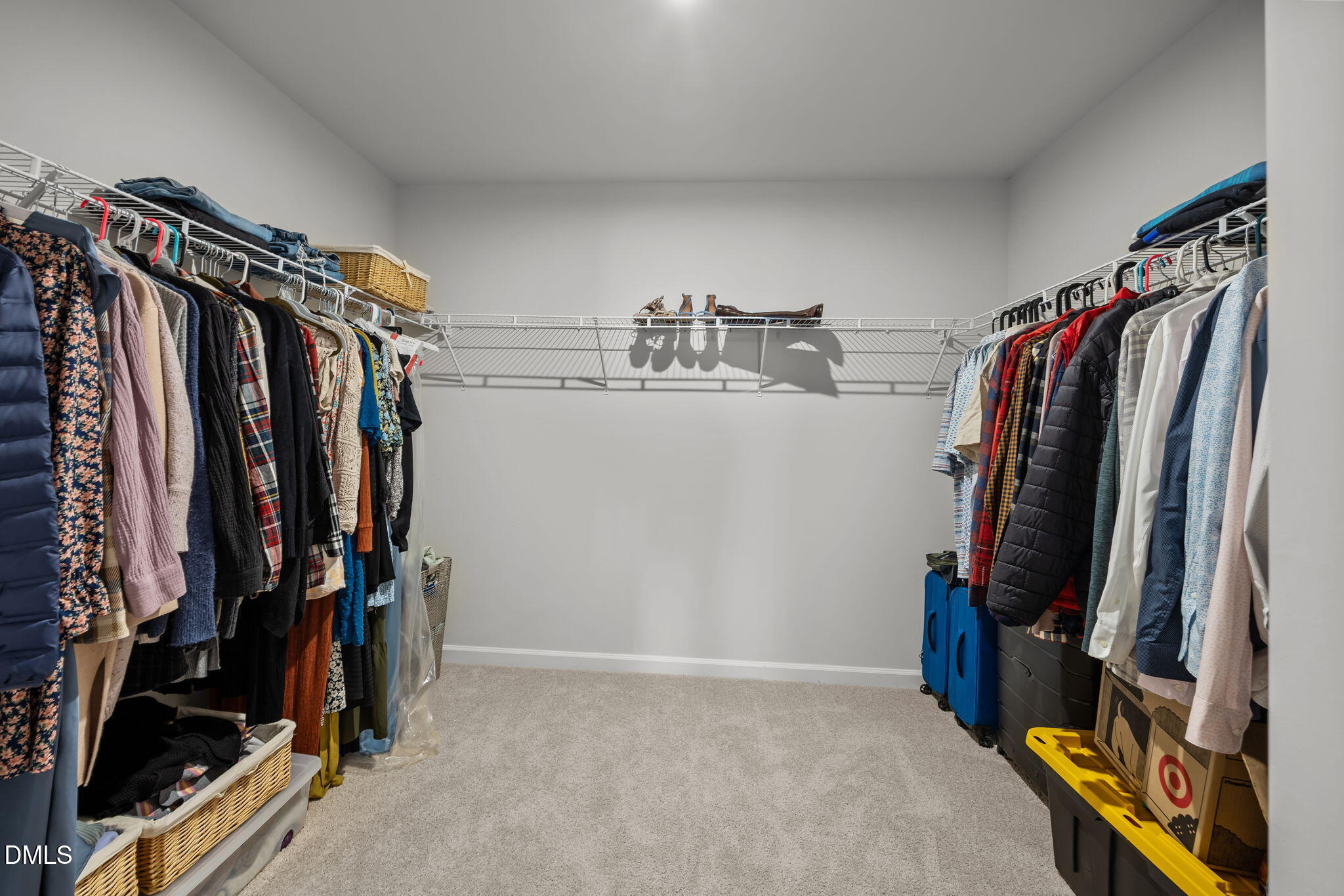 2117 Fletchers Ridge Drive Durham, NC 27703 - Photo 35 of 46 a view of walk in closet with clothes