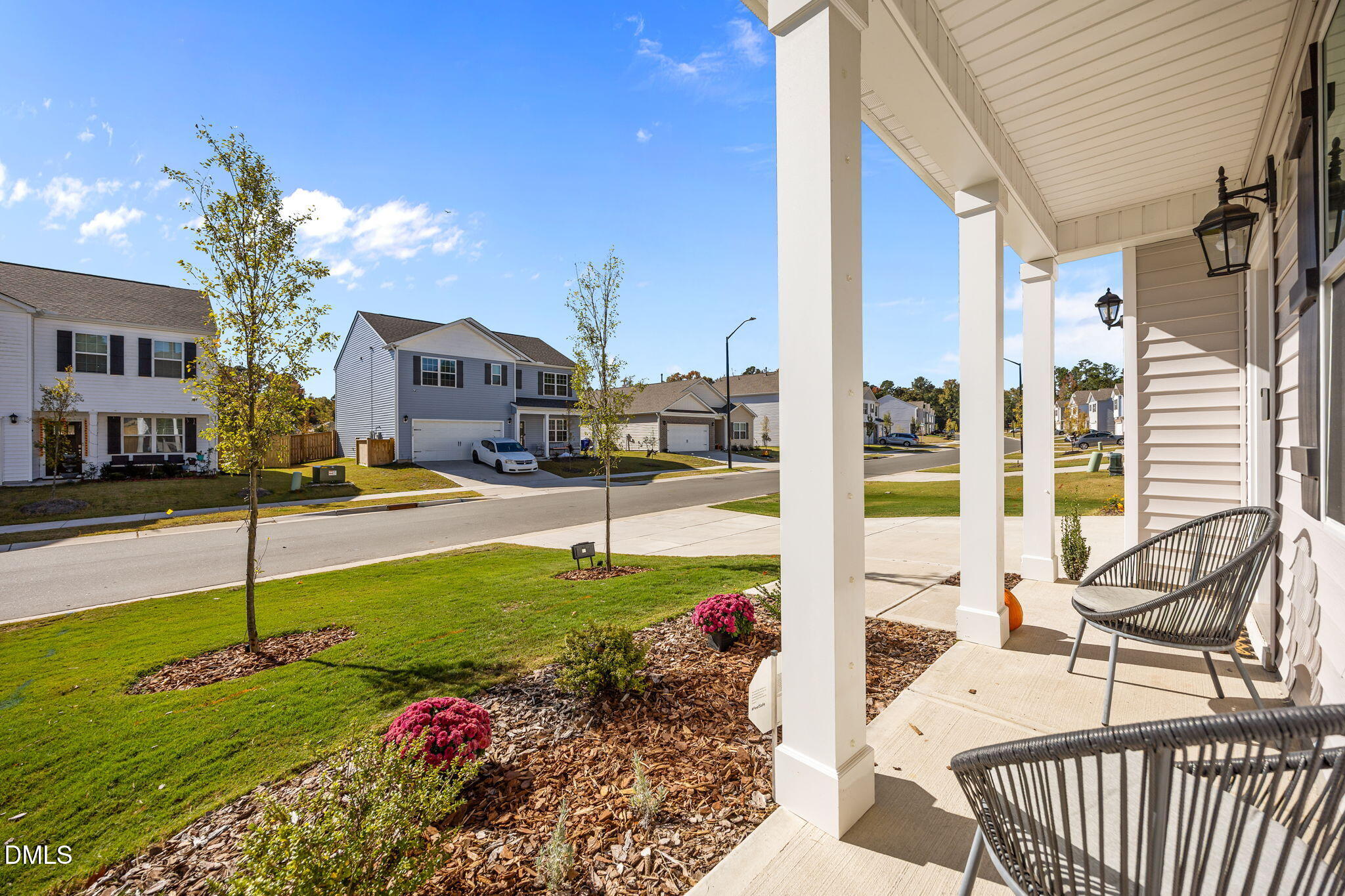 2117 Fletchers Ridge Drive Durham, NC 27703 - Photo 5 of 46 a view of a patio with a table and chairs