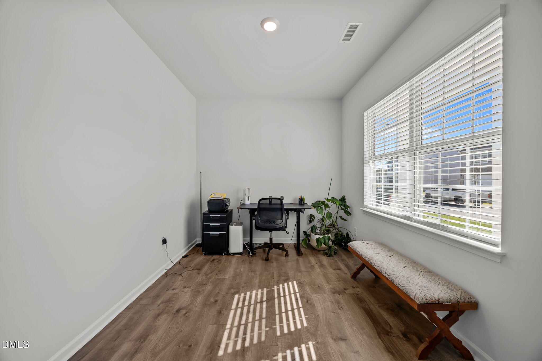 2117 Fletchers Ridge Drive Durham, NC 27703 - Photo 6 of 46 a view of a livingroom with furniture and window