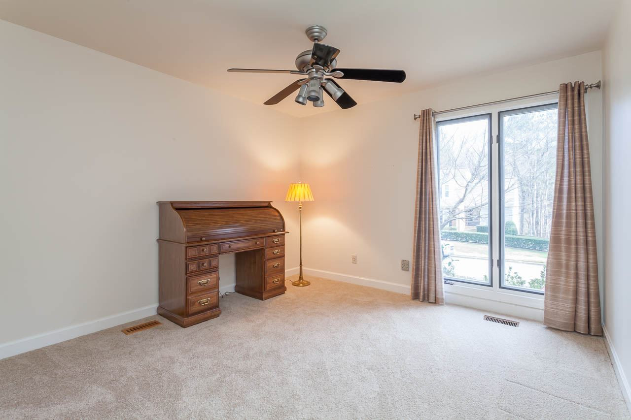 6909 Valley Ridge Court Raleigh, NC 27615 - Photo 23 of 25 Another Secondary Bedroom with Double Closet and Convenient to the large Walk-in Cedar Closet. Bedroom
