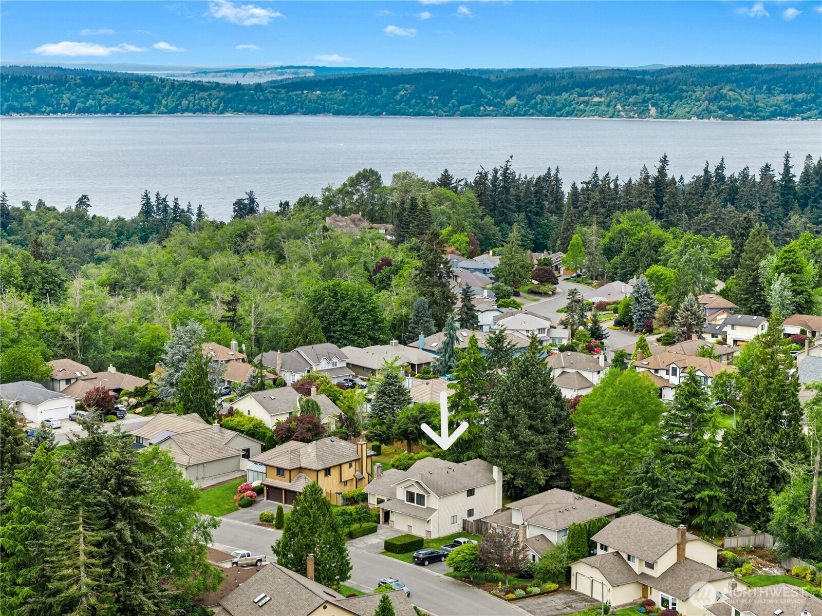 5211 103rd Street Southwest, Unit SW Mukilteo, WA 98275 - Photo 36 of 40 a view of a lake with a city view