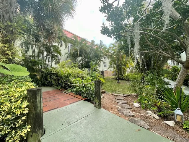 a view of backyard with green space