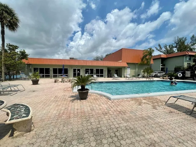 a view of house with outdoor space and porch
