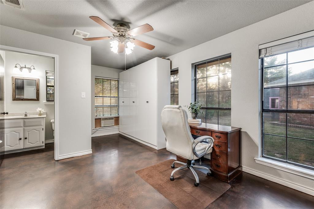 131 Cunningham Road Denton, TX 76208 - Photo 29 of 40 a view of a workspace with furniture and a window