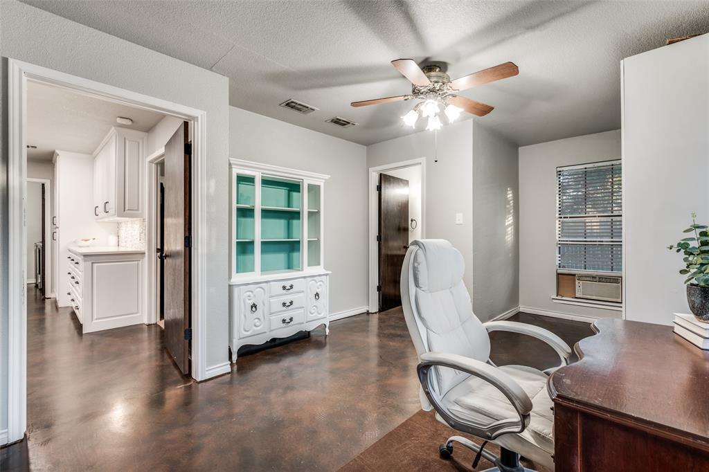 131 Cunningham Road Denton, TX 76208 - Photo 30 of 40 a view of a workspace with furniture and a window