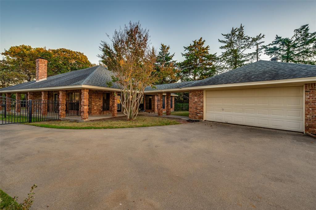 131 Cunningham Road Denton, TX 76208 - Photo 34 of 40 front view of house with a garden