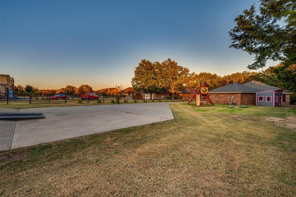 131 Cunningham Road Denton, TX 76208 - Photo 35 of 40 a view of a house with a yard