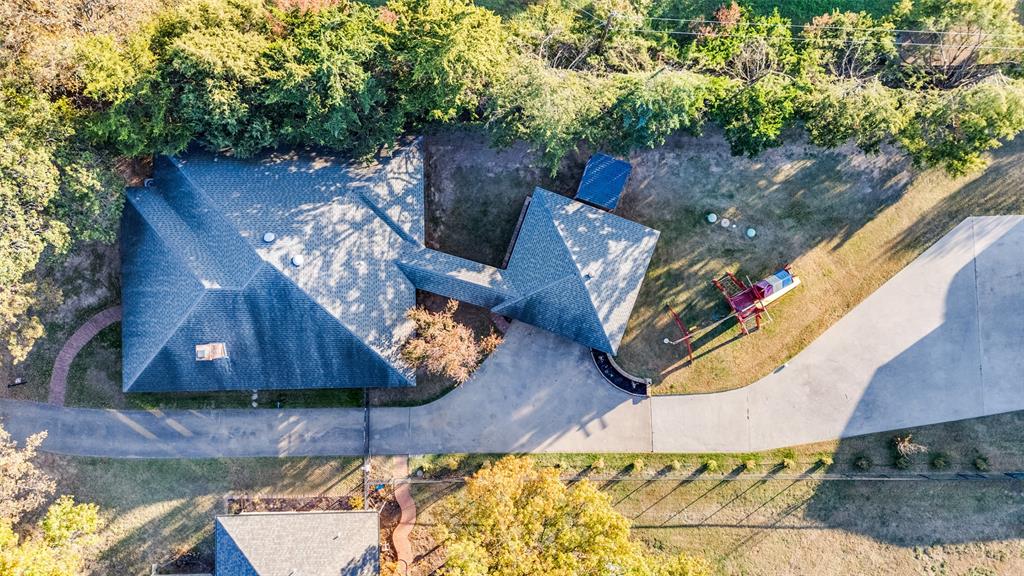131 Cunningham Road Denton, TX 76208 - Photo 39 of 40 a view of a wooden floor in front of a house
