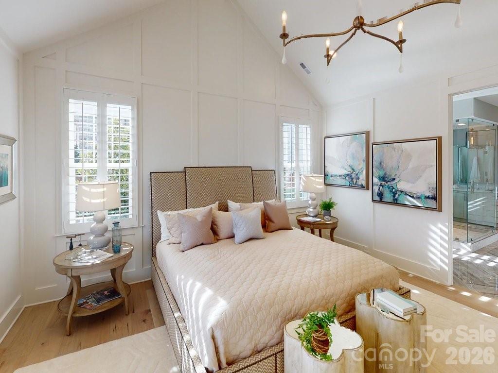 110 Willow Vw Loop Davidson, NC 28036 - Photo 22 of 42 a bedroom with a bed and a table